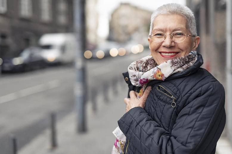 Woman smiling with dentures in Blairmore, Alberta at Crowsnest Dental